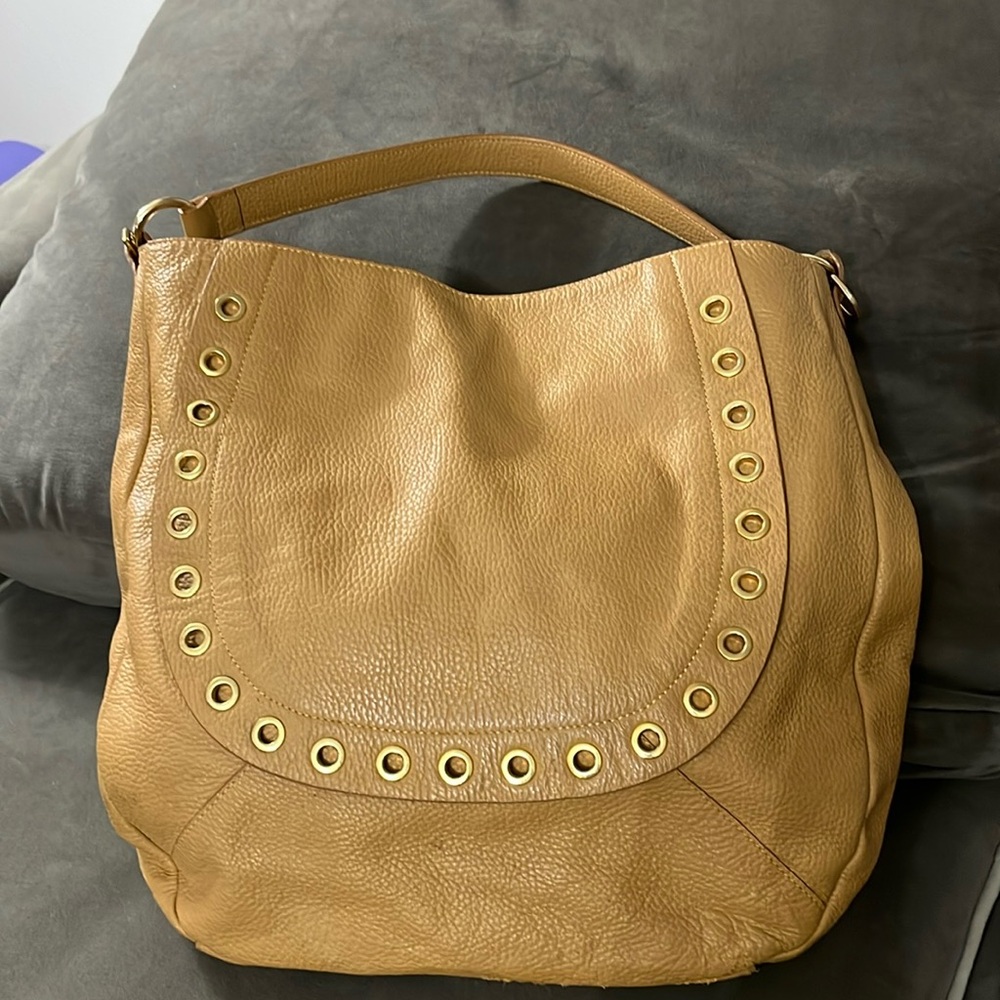 Innue beige handbag one strap leather gold hardware rings in front inside pocket